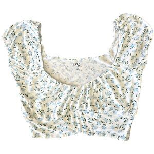 PAC Floral Crop Top. Chic floral crop top with blue and green accents.
